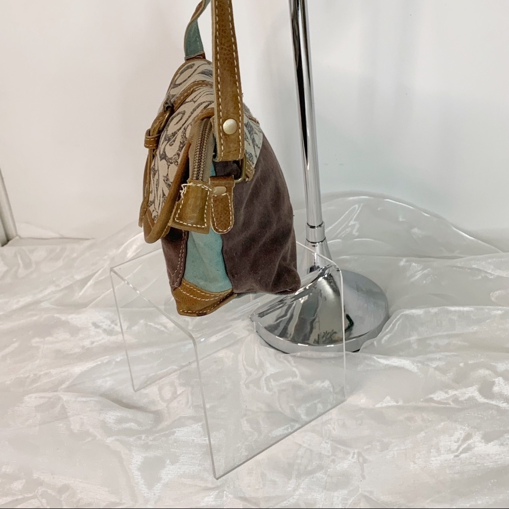 Myra Bag
Leaf Print Small and Cross Body Bag - Picture 3 of 6